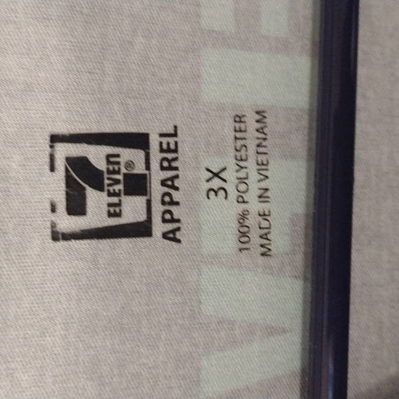 7-Eleven uniform polo snap button-up. Black/neon green.Size 3XL - Picture 2 of 5